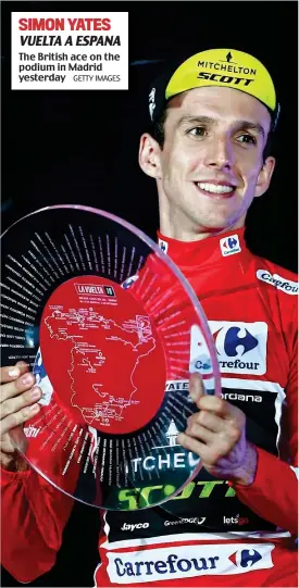  ?? GETTY IMAGES ?? The British ace on the podium in Madrid yesterday VUELTAAESP­ANA SIMON YATES