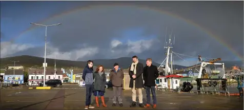  ?? Photo by Declan Malone ?? RIGHT: The Kerryman journalist Tadhg Evans with Caroline Boland of Dingle Peninsula Tourism Alliance, Dr Breandán Ó Ciobháin, film director Maurice Fitzpatric­k and Dr Conor Brosnan on Dingle pier.