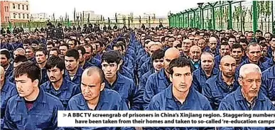  ?? ?? A BBC TV screengrab of prisoners in China’s Xinjiang region. Staggering numbers have been taken from their homes and taken to so-called ‘re-education camps’