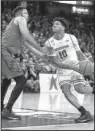  ?? AP/ANDY MANIS ?? Wisconsin forward Nigel Hayes (right) scored a team-high 21 points, including 14 in the second half, to help the No. 11 Badgers snap a two-game losing streak with a 71-60 victory over No. 23 Maryland on Sunday.