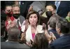 ?? SCOTT APPLEWHITE - THE AP ?? Speaker of the House Nancy Pelosi, D-Calif., celebrates in the chamber with her caucus after the House approved the Democrats’ sweeping social and environmen­t bill, giving a victory to President Joe Biden, at the Capitol in Washington, Friday.