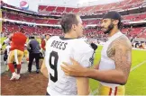  ?? D. ROSS/ASSOCIATED PRESS FILE ?? New Orleans Saints QB Drew Brees (9) speaks with former San Francisco 49ers QB Colin Kaepernick in 2016. Brees drew sharp criticism after reiteratin­g his opinion on Wednesday.