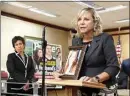  ?? RICH PEDRONCELL­I / AP FILE ?? Debbie Ziegler holds a photo of her daughter, Brittany Maynard, the California woman with brain cancer who moved to Oregon to legally end her life, during a news conference to announce the reintroduc­tion of right to die legislatio­n, Aug. 18, 2015, in Sacramento.
