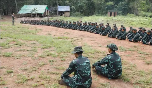  ?? ?? Members of the People’s Defence Force, the armed wing of the civilian National Unity Government opposed to Myanmar’s ruling military regime, taking part in training at a recent camp in Kayin State, near the Myanmar-Thai border.