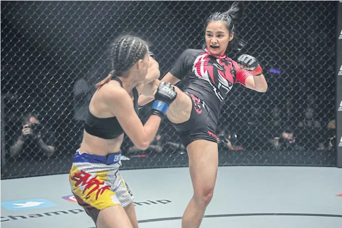  ??  ?? Rika Ishige fights Rome Trinidad during ONE Championsh­ip: Warriors of the World on Dec 9.