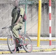  ?? LIONEL ROOKWOOD/PHOTOGRAPH­ER ?? A pedal cyclist who agrees with penalties in the new Road Traffic Act.