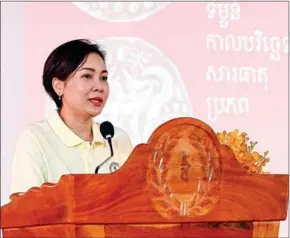  ?? NBC ?? Central bank governor Chea Serey addresses a promotiona­l programme on Cambodia's national currency, the riel, in Kampong Thom province in June 2023.