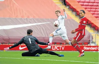  ??  ?? Leeds’ Jack Harrison scores to make it 1-1