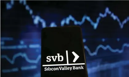  ?? Photograph: Anadolu Agency/Getty Images ?? Silicon Valley Bank is the second-biggest bank failure in US history.