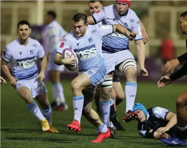  ?? Mark Fletcher/huw Evans Agency ?? Cardiff Blues’ Garyn Smith breaks out of a tackle by Newcastle Falcons’ Jamie Blamire when the sides met in the European Challenge Cup in December.