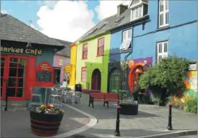  ??  ?? CHEERFUL: Cove’s colourful buildings are a bright spot in Ireland’s dreary weather, says Lydia Lacerda.