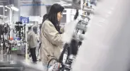  ?? ?? Employees work at a factory in Fuyang, in eastern Anhui province, China, March 28, 2024.