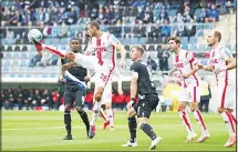  ??  ?? Bielefeld’s Sergio Cordova (back left), and Fabian Klos (third from left), fight for the ball against Cologne’s Ellyes Skhiri (second from left), Jonas Hector (second from right), and Rafael Czichos (right), during the German Bundesliga soccer match between Arminia Bielefeld and 1.FC Cologne in
Bielefeld, Germany on Sept 26. (AP)