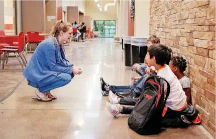  ??  ?? Kaylee Vaughn is programs director for Kids Club, an after-school care program at the Cole Community Center in Oklahoma City.