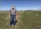  ??  ?? McLaughlin shows the property line Thursday where he and Barbara Weibel own land near the Chico Airport in Chico, which they offered to the city in fall 2020for a sanctioned campground.