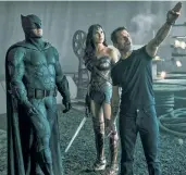  ??  ?? Batman (Ben Affleck) and Wonder Woman (Gal Gadot) are among the superheroe­s who make up the Justice League in Zack Snyder’s (right) film.