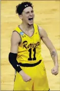  ?? Chuck Burton /
AP ?? UMBC’s K.J. Maura celebrates the team’s 74-54 win over Virginia in the first round game of the NCAA Tournament.