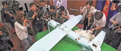  ?? LEE JUNG-HOON/YONHAP VIA AP, FILE ?? South Korea’s military said it detected five drones from North Korea crossing the border Monday. A suspected North Korean drone is viewed at the Defense Ministry in Seoul, South Korea, in 2017.