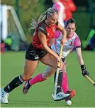  ?? ?? UBLHC’s Lily Roberts drives past former Welsh internatio­nal Alison Dawn- Mackenzie