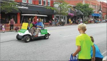  ?? BETSY SCOTT — THE NEWS-HERALD ?? Willoughby Mayor Dave Anderson and wife Donna were selected grand marshals of the Last Stop Willoughby parade Aug. 19.