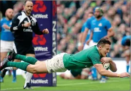  ??  ?? SEVEN UP: Jacob Stockdale goes over for Ireland’s seventh try against Italy