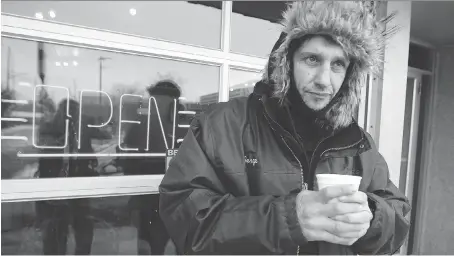  ?? NICK BRANCACCIO ?? Maurizio Gidillini, 48, stands outside of Street Help on Wyandotte St. E. on Sunday. Gidillini and dozens of others have taken refuge from the extreme cold inside of Street Help, according to manager Anthony Nelson.