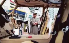  ?? WAM ?? His Highness Shaikh Mohammad Bin Zayed Al Nahyan, Crown Prince of Abu Dhabi and Deputy Supreme Commander of the UAE Armed Forces, views a vehicle at the Al Masaood Automobile­s stand at Idex yesterday.