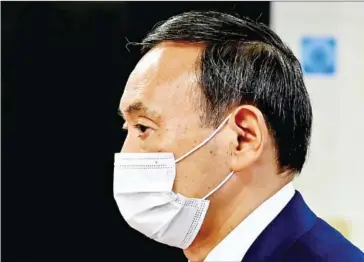  ?? AFP ?? If Japanese Prime Minister Yoshihide Suga is to follow a ‘total reassessme­nt of Japan’s post-war diplomacy’, he must carefully prepare strategies on the pending issues and aim for steady progress.