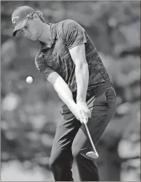  ?? Tony Dejak / The Associated Press ?? Thomas Pieters chips to the fourth green during the first round of the Bridgeston­e Invitation­al at Firestone Country Club on Thursday.