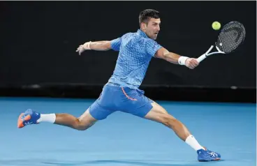  ?? (AFP) ?? Serbia's Novak Djokovic hits a return to Greece's Stefanos Tsitsipas in the final on Sunday