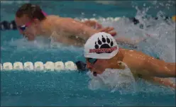  ?? AUSTIN HERTZOG - MEDAINEWS GROUP ?? Boyertown’s Owen Miller, near, and Owen J. Roberts’ Dalton Fink compete in the 100 butterfly. Miller set a pool record in the event.