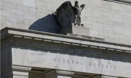 ??  ?? The Federal Reserve’s ‘crazy’ decisions had been attacked for months by Trump, who said the economy would go up ‘like a rocket if we did some lowering of rates’. Photograph: Leah Millis/Reuters