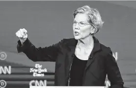  ?? Win McNamee / Getty Images / TNS ?? In polls leading up to the debate, Sen. Elizabeth Warren was seen as the emerging front-runner and spent much of the debate fending off criticism.