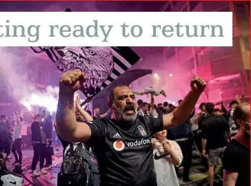  ??  ?? Champions…Besiktas fans celebrate on the streets of Istanbul after their team’s title victory