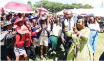  ?? ?? First Lady Dr Auxillia Mnangagwa is welcomed by schoolchil­dren in Mashonalan­d East during her career guidance, grooming, etiquette and stay in school programme in the province on Monday