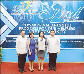  ??  ?? Rema Azaula (2nd from right), valedictor­ian of the BMP training course for ACDI executives, together with (from left:) Ret. Major Gen. Jovito Gammad, former president of ACDI; Armi Trenas, LPPI president; and Ret. Major Gen. Llanto, ACDI board chairman, during the company’s 32nd anniversar­y and awarding ceremony held at ACDI’s office in Bicutan, Taguig.