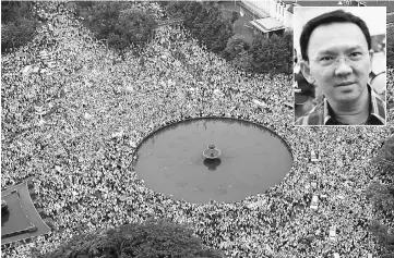  ??  ?? Members of Muslim groups attend a protest against Purnama in Jakarta, Indonesia. (Inset) Basuki Tjahaja Purnama. — Rueters photo