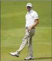  ?? AP photo ?? Lucas Glover reacts to a missed birdie putt on the seventh green Friday at the St. Jude Championsh­ip.