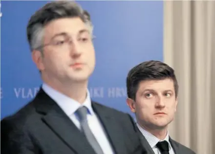  ?? REUTERS ?? Premijer Andrej Plenković sa svojim ministrom financija Zdravkom Marićem