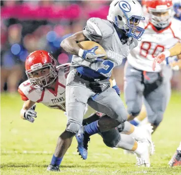  ?? OKLAHOMAN] [PHOTO BY BRYAN TERRY, THE ?? Guthrie’s CJ Ward tries to get past Carl Albert’s Ezra Gustafason during Friday’s game in Guthrie.