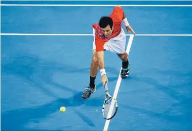  ?? Photo: GETTY
IMAGES ?? Back at him: American Brian Baker on his way to beating Jerzy Janowicz of Poland in the Heineken Open first round.