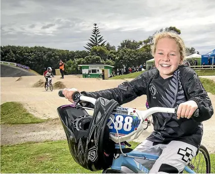  ?? GRANT MATTHEW/STUFF ?? Sophie Riddick, 12, checks out the competitio­n at the 2017 Shark Tank Challenge held at Bell Block’s BMX track on Sunday. The venue will host the national championsh­ips in 2018.