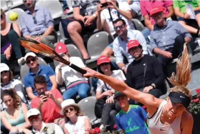  ?? AFP ?? Ukraine’s Elina Svitolina serves to Russia’s Darja Kasatkina during Rome’s WTA Tennis Open tournament on Thursday. —