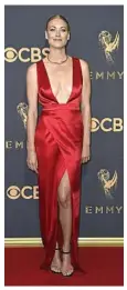  ??  ?? Yvonne Strahovski stuns in this red gown.