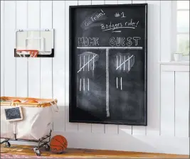  ?? COURTESY POTTERY BARN KIDS ?? Pin boards, whiteboard­s and chalkboard­s, such as the Framed Navy Chalkboard, allow kids to put their individual­ity on display and change things up over time. Such boards are a good parent-child DIY project, too.