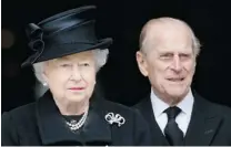  ?? LEON NEAL/ AFP/ GETTY IMAGES ?? The Queen and Prince Philip, Duke of Edinburgh, attend the funeral of Margaret Thatcher on Wednesday.