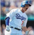  ?? RYAN KANG/ASSOCIATED PRESS ?? Joc Pederson of the Dodgers reacts after hitting a grand slam in the third inning against the Padres on Monday.