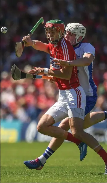  ??  ?? Stephen McDonnell of Cork in action against Shane Bennett of Waterford during the Munster Senior hurling championsh­ip semi-final at Semple Stadium.
