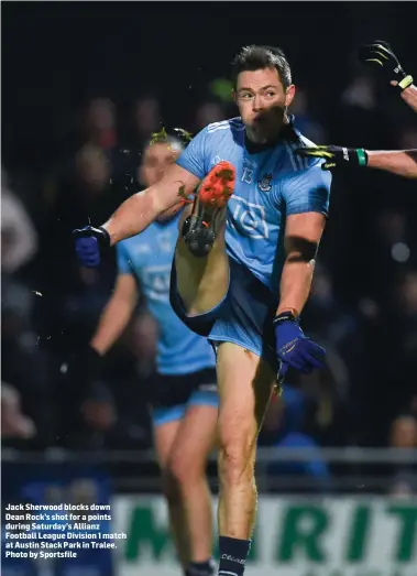  ??  ?? Jack Sherwood blocks down Dean Rock’s shot for a points during Saturday’s Allianz Football League Division 1 match at Austin Stack Park in Tralee. Photo by Sportsfile