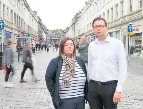  ?? Picture by Mhairi Edwards. ?? CLAIM LODGED: Helen Meldrum and Drew Duffy, of the GMB union, in the city centre.